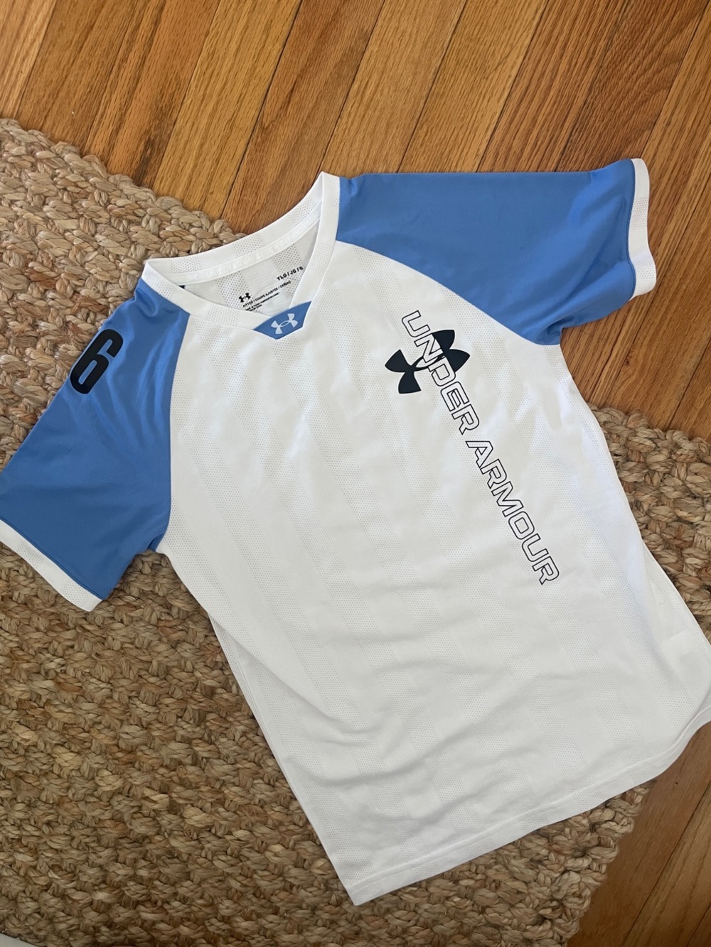 Under Armour White and Blue Kids Athletic Jersey with Sleeve Number